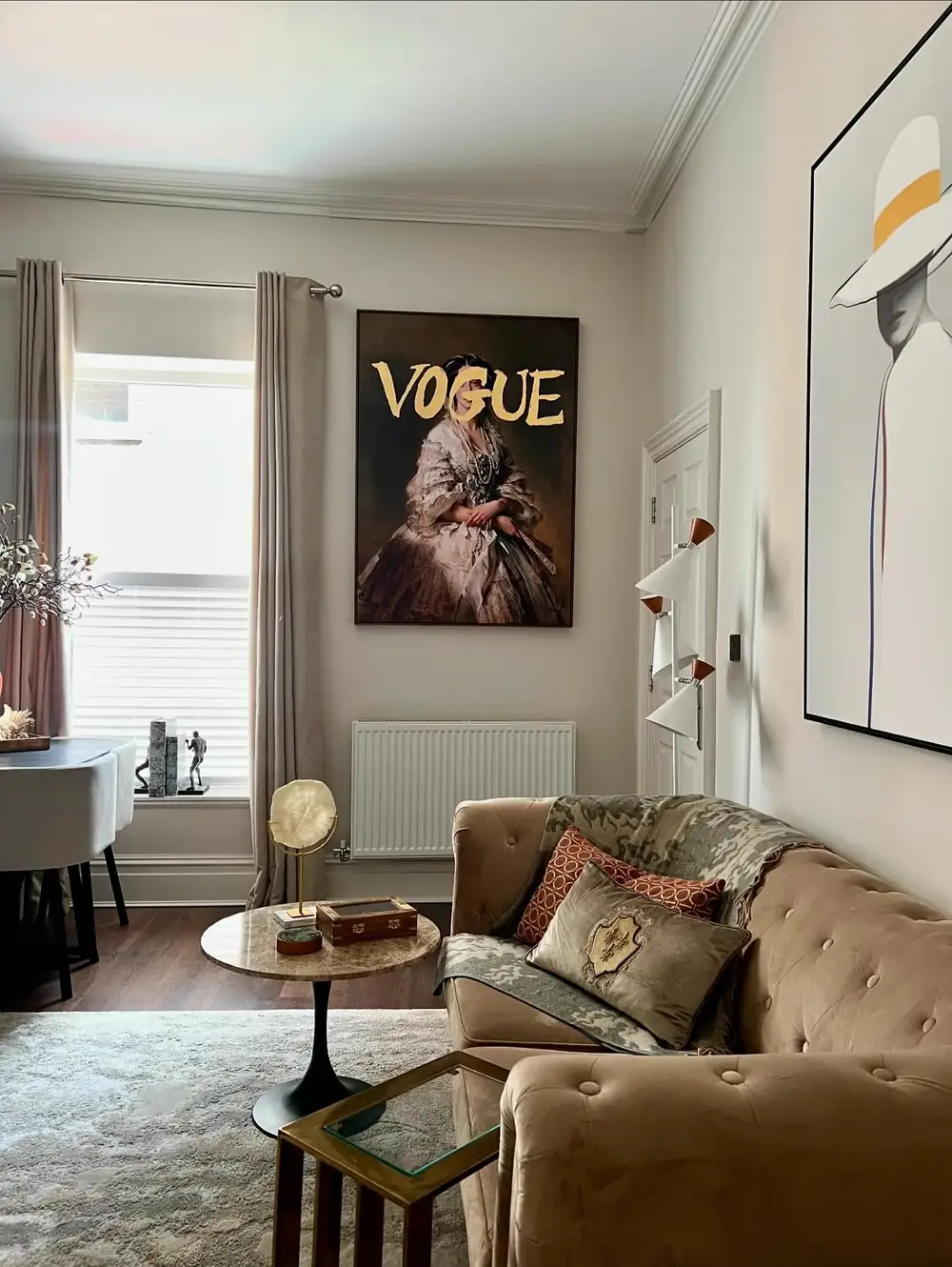 Lounge with a chesterfield sofa and statement artwork